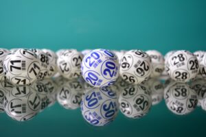 Bingo balls on a mirrored surface